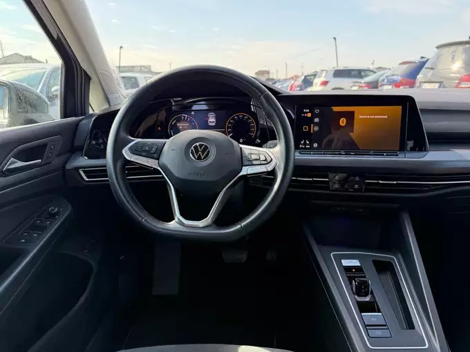 Volkswagen ID.3 electric car interior available for rental in Albania via Localrent – modern EV dashboard with infotainment and navigation features.