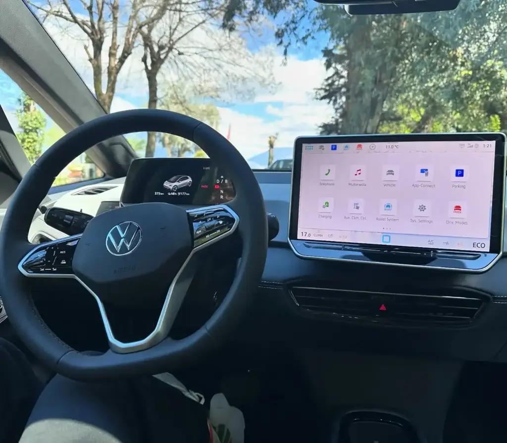 Volkswagen ID.3 interior with digital display during EV travel — part of the EV charging stations in Albania experience