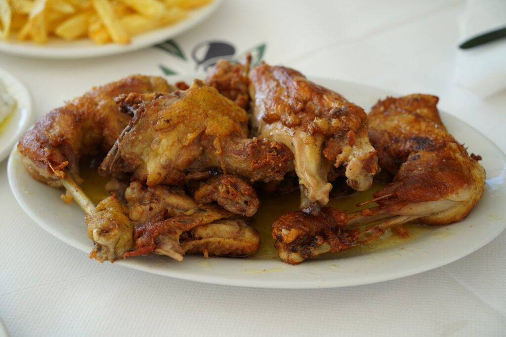 Homemade roasted chicken served at the Tamo’s Farm family restaurant in South Albania