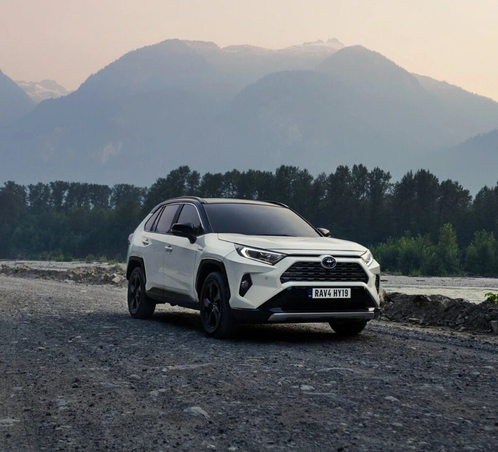 Toyota RAV4 Hybrid on a remote road in Albania – while not a full EV, this type of hybrid SUV is listed among alternatives on DiscoverCars for situations where electric car rental in Albania may not be practical, such as mountain regions.
