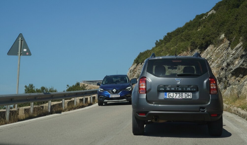 Automatic Car Rental in Albania: No-Stall Driving for UK, US and Aussie Travellers 1 Silver Dacia Duster with automatic transmission on the SH8 mountain road at Llogara Pass, Albania.