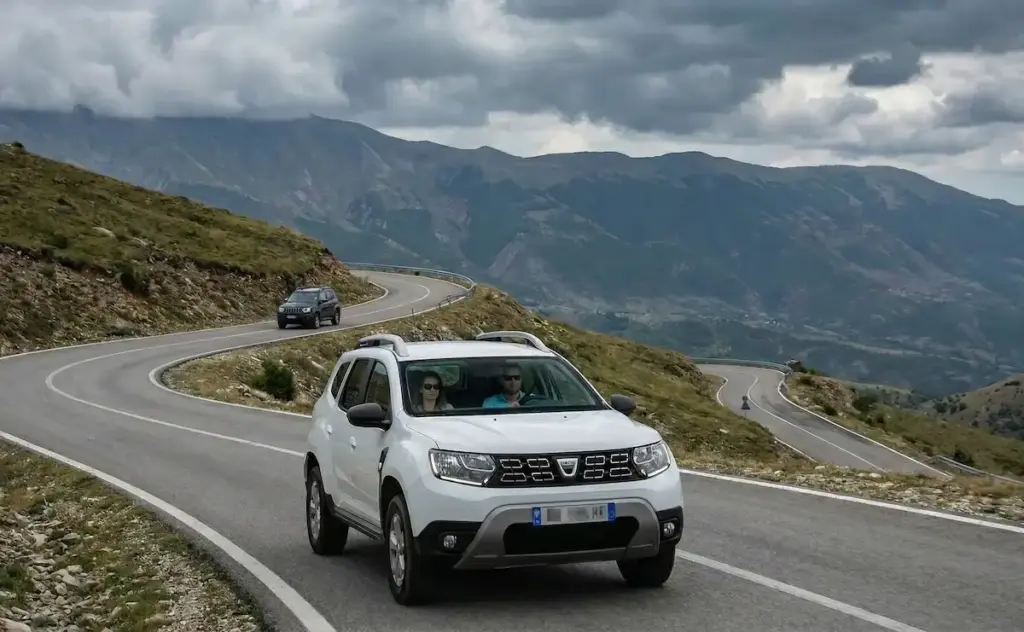 Dacia Duster Rental Albania: 2WD vs 4WD | Theth Road Test | Real Fuel Costs 5 Dacia Duster 2WD rental Albania mountain road test SH21 Theth route hairpin turns.